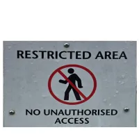 sign saying restricted area  and no unauthorised access 